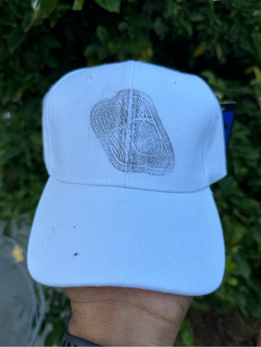White Baseball Cap with Line Art Graphic